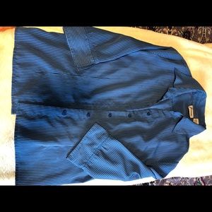 Joanna’s blue and white stripped button up shirt!